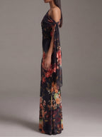 Irene | Vestido Maxi Negro de Gasa Plisada con Estampado y Un Solo Hombro