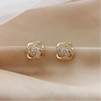 Lourdes | Pendientes dorados en espiral con cristales
