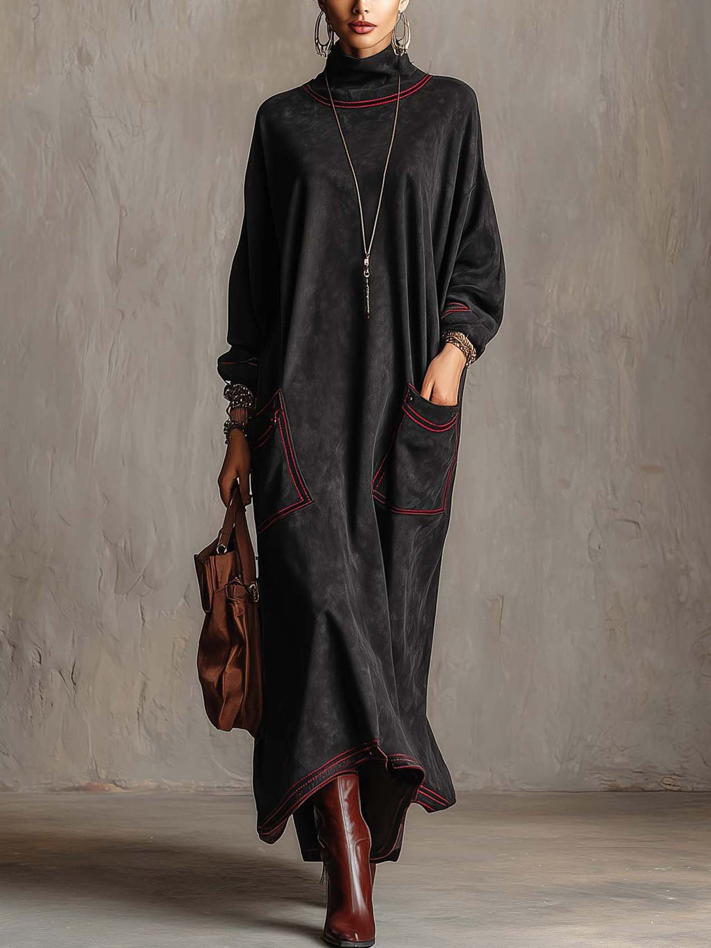 Estela | Vestido largo de ante sintético negro con pespuntes rojos y bolsillos