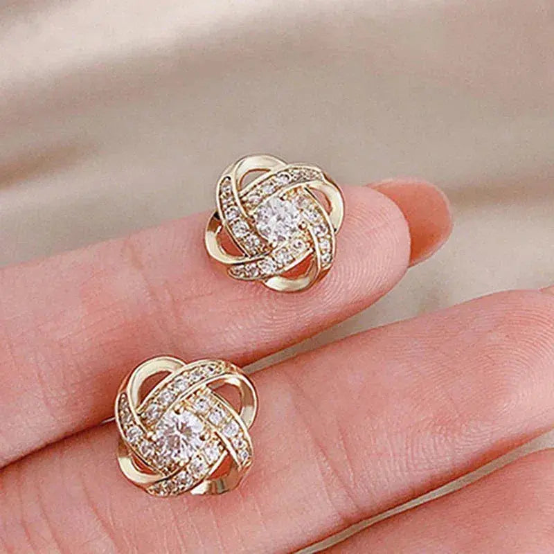 Lourdes | Pendientes dorados en espiral con cristales