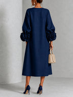 Catalina | Vestido midi con mangas abullonadas y botones de flor