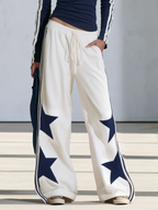 Celia | Conjunto de top de manga larga con estrellas y pantalón ancho azul marino
