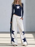 Celia | Conjunto de top de manga larga con estrellas y pantalón ancho azul marino