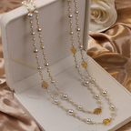 Mercedes, collar dorado con perlas