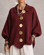 Sandra | Rebeca oversize con cuello y botones dorados